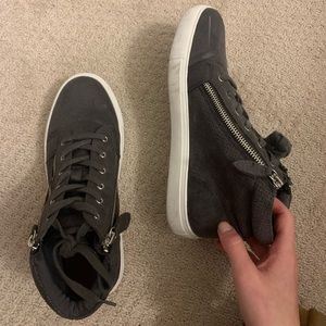 Grey fashion sneaker. Ties and zips. Size 7.